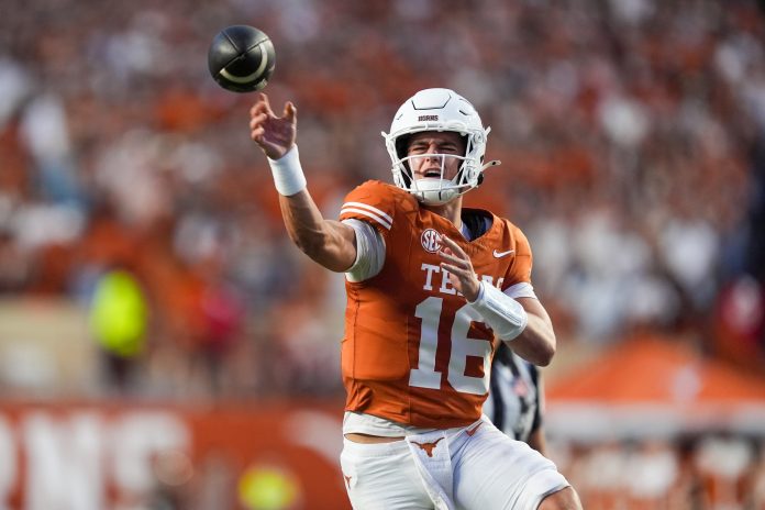 Texas Longhorns quarterback Arch Manning (16) throws a touchdown pass in the first half against the Louisiana Monroe Warhawks at Darrell K Royal-Texas Memorial Stadium.