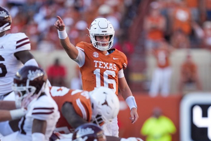 Texas Longhorns quarterback Arch Manning (16) signals first down in the second half against the Mississippi State Bulldogs at Darrell K Royal-Texas Memorial Stadium.