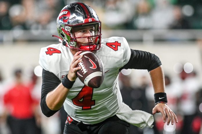 Western Kentucky's Bailey Zappe scrambles during the first quarter against Michigan State on Saturday, Oct. 2, 2021, at Spartan Stadium in East Lansing.