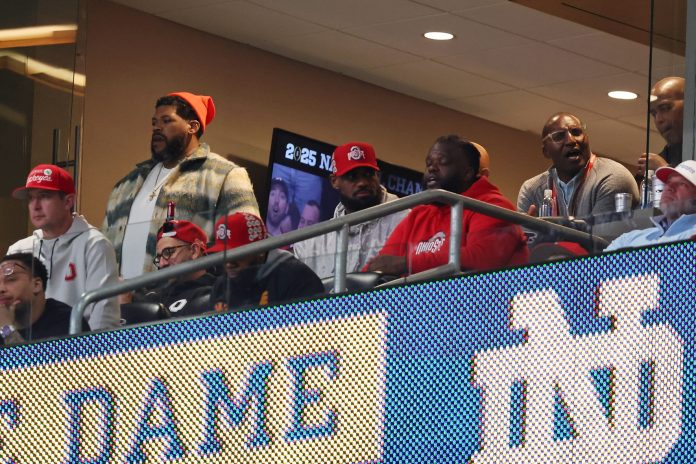 Lebron James attends the CFP National Championship college football game at Mercedes-Benz Stadium.