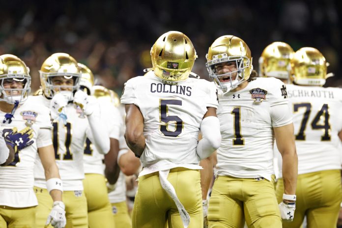 Notre Dame Fighting Irish wide receiver Beaux Collins (5) celebrates after scoring a touch down during the second quarter against Georgia Bulldogs at Caesars Superdome.