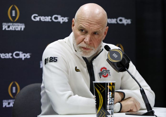 Ohio State Buckeyes defensive coordinator Jim Knowles talks to the media during 2025 CFP National Championship Media Day at Georgia World Congress Center, Building A.