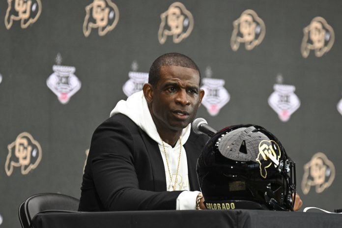 Colorado Buffaloes head coach Deion Sanders speaks to the media during the Big 12 Media Days at Allegiant Stadium.