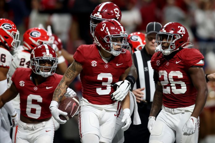 Alabama Crimson Tide wide receiver Jermaine Burton (3) reacts after making a catch in the second quarter against the Georgia Bulldogs at Mercedes-Benz Stadium.