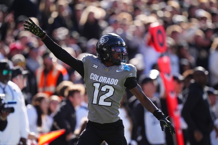 Colorado Buffaloes wide receiver Travis Hunter (12) calls for the ball in the first quarter against the Utah Utes at Folsom Field.