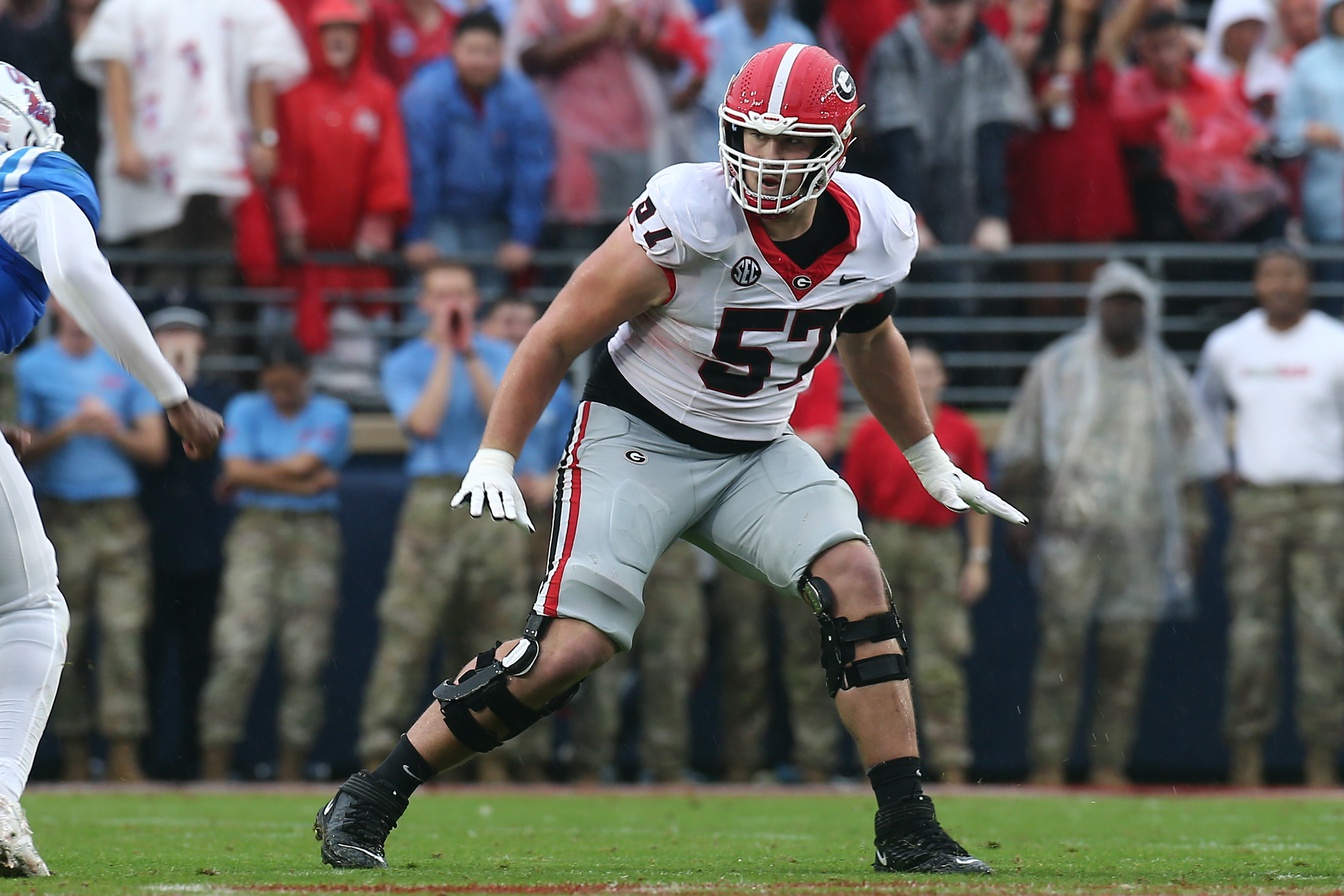 Georgia Bulldogs offensive lineman Monroe Freeling (57) blocks during the first half against the Mississippi Rebels at Vaught-Hemingway Stadium.