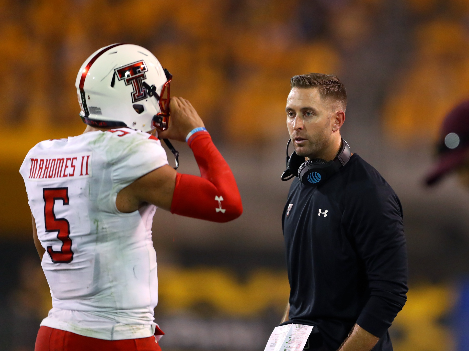 Texas Tech Red Raiders quarterback Patrick Mahomes II (5) and head coach Kliff Kingsbury against the Arizona State Sun Devils in the first quarter at Sun Devil Stadium.