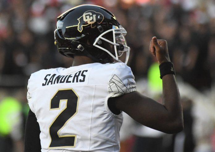 Colorado's Shedeur Sanders gestures after a touchdown against Texas Tech in a Big 12 football game Saturday, Nov. 9, 2024, at Jones AT&T Stadium.