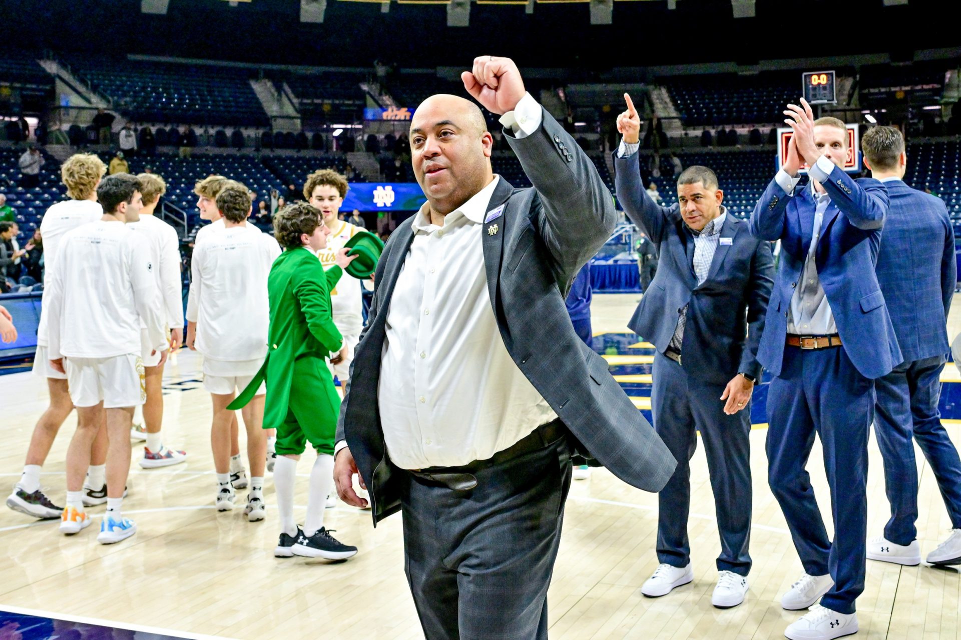 Notre Dame Fighting Irish head coach Micah Shrewsberry gestures to the student section after Notre Dame defeated the Georgia Tech Yellow Jackets 71-68 at the Purcell Pavilion.