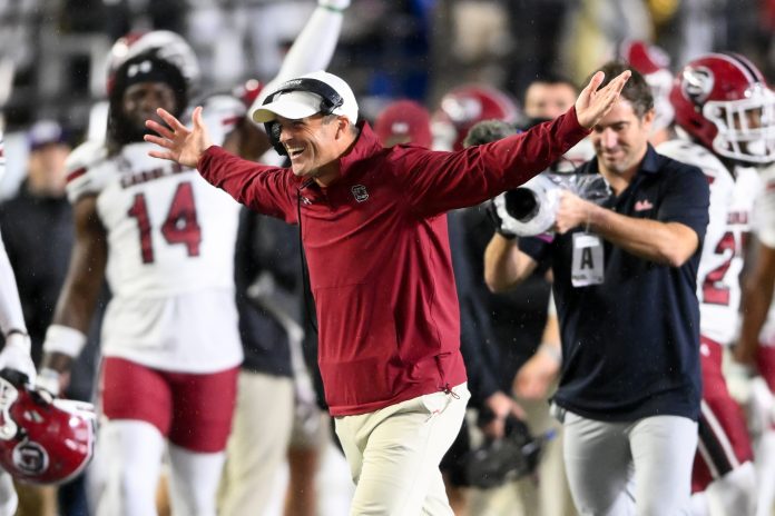 South Carolina Gamecocks head coach Shane Beamer celebrates the win with defensive back Vicari Swain (4) against the Vanderbilt Commodores during the second half at FirstBank Stadium.