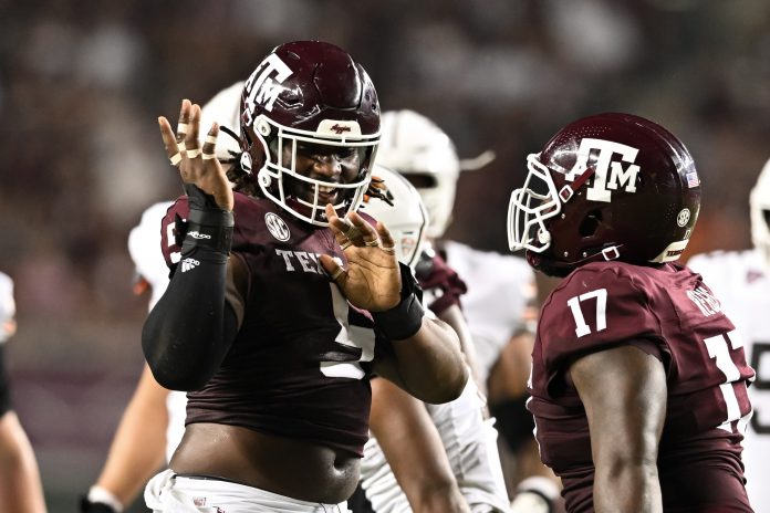 Texas A&M Aggies defensive lineman Shemar Turner (5) celebrates after sacking Bowling Green Falcons quarterback Baron May, not pictured, during the third quarter at Kyle Field.