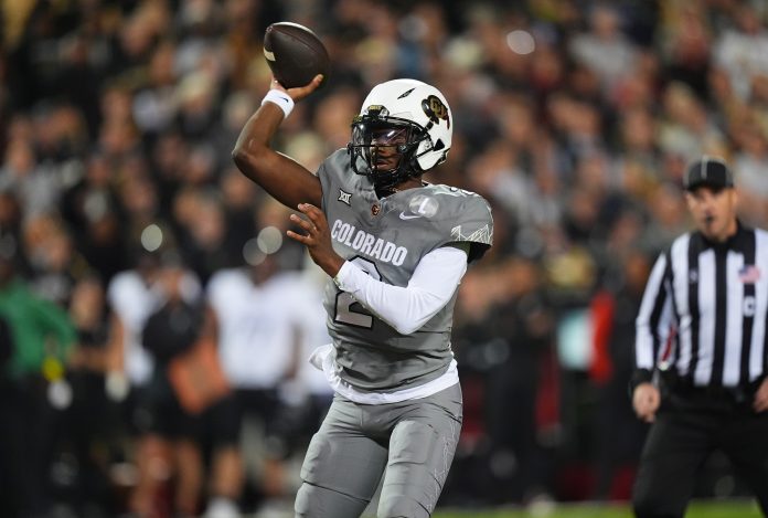 Colorado Buffaloes quarterback Shedeur Sanders (2) prepares to pass the ball in the first quarter against the Cincinnati Bearcats at Folsom Field.