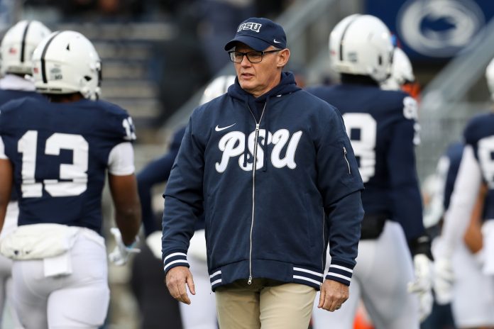 Penn State Nittany Lions defensive coordinator Tom Allen walks on the field during warm ups before a game against the Maryland Terrapins at Beaver Stadium.