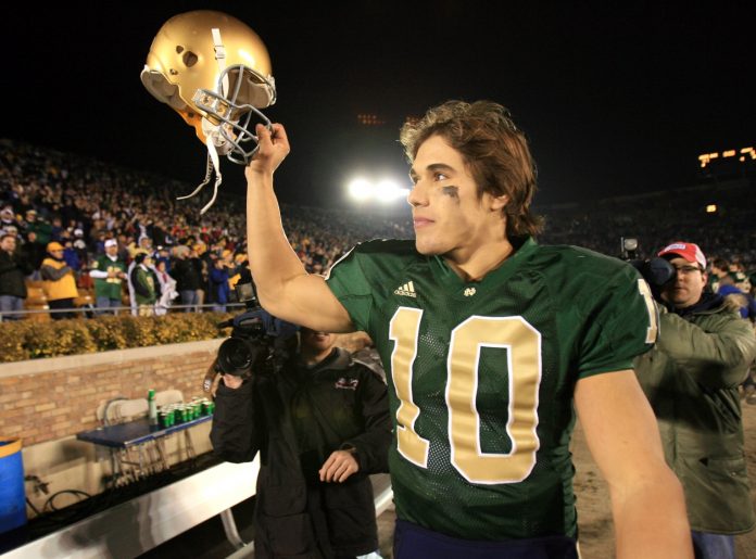 Notre Dame Fighting Irish quarterback (10) Brady Quinn salutes the fans following the 41-9 victory over the Army Black Knights at Notre Dame Stadium.