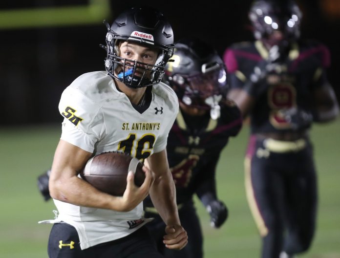 Saint AnthonyÕs quarterback Gary Merrill (16) runs for a first half touchdown against Iona during football action at Iona Prep in New Rochelle Oct. 4, 2024.