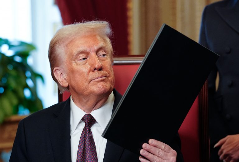 Newly sworn-in President Donald Trump takes part in a signing ceremony in the President’s Room following the 60th inaugural ceremony on January 20, 2025, at the US Capitol in Washington, DC. Trump became the 47th president of the United States in a rare indoor inauguration ceremony. (Photo by Melina Mara /The Washington Post)