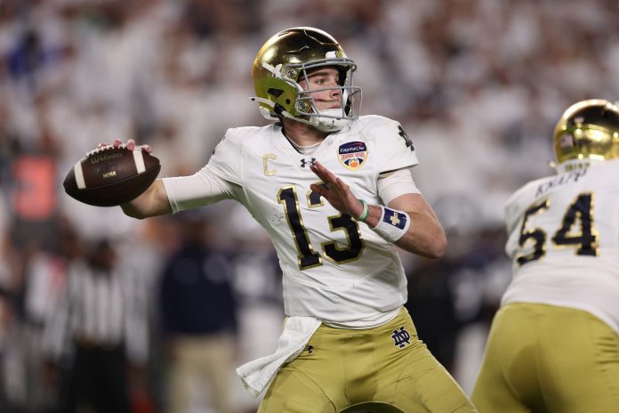 Notre Dame Fighting Irish quarterback Riley Leonard (13) looks to throw a pass in the first half against the Penn State Nittany Lions at Hard Rock Stadium. Mandatory