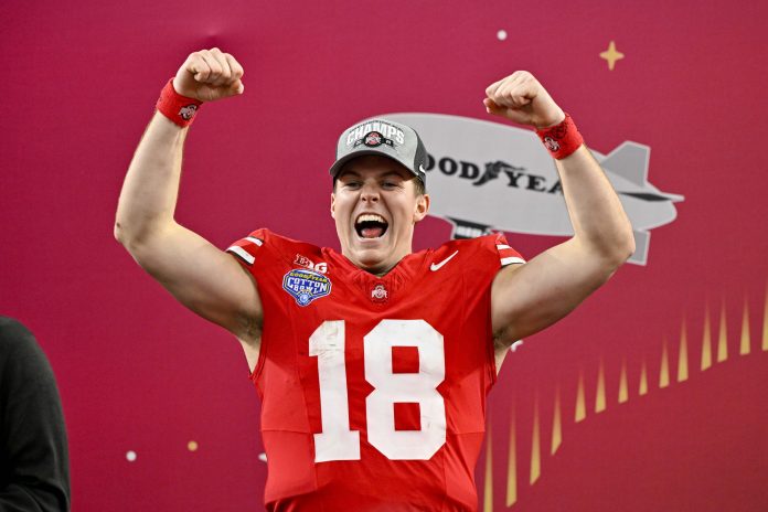 Ohio State Buckeyes quarterback Will Howard (18) celebrates after the Buckeyes defeat the Texas Longhorns at AT&T Stadium.