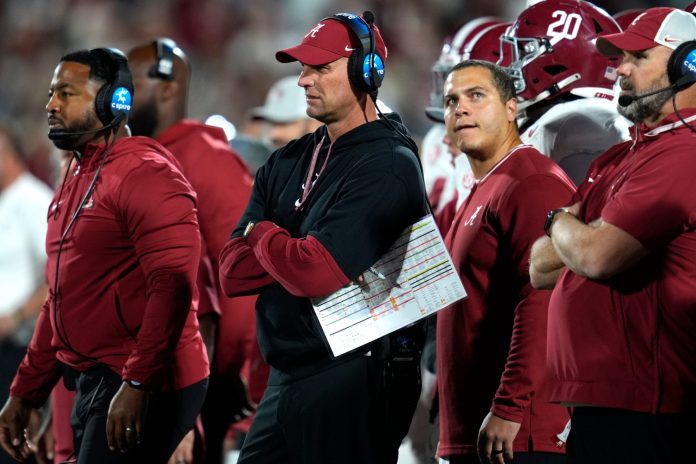 Alabama coach Kalen DeBoer watches during a college football game between the University of Oklahoma Sooners (OU) and the Alabama Crimson Tide at Gaylord Family - Oklahoma Memorial Stadium in Norman, Okla., Saturday, Nov. 23, 2024. Oklahoma won 24-3.