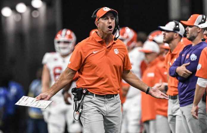 Clemson Tigers head coach Dabo Swinney reacts after a call by an official a during the first quarter of the 2024 Aflac Kickoff Game against the Georgia Bulldogs Bulldogs at Mercedes-Benz Stadium.