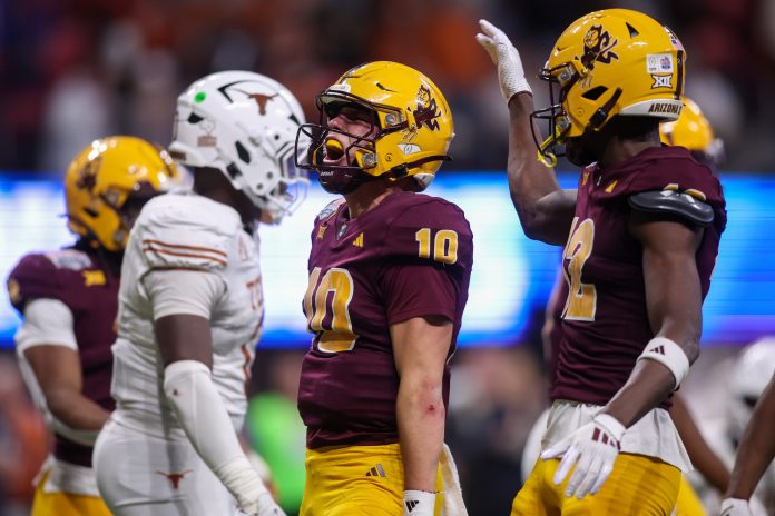 Arizona State Sun Devils quarterback Sam Leavitt (10) reacts after a run against the Texas Longhorns in overtime at Mercedes-Benz Stadium.