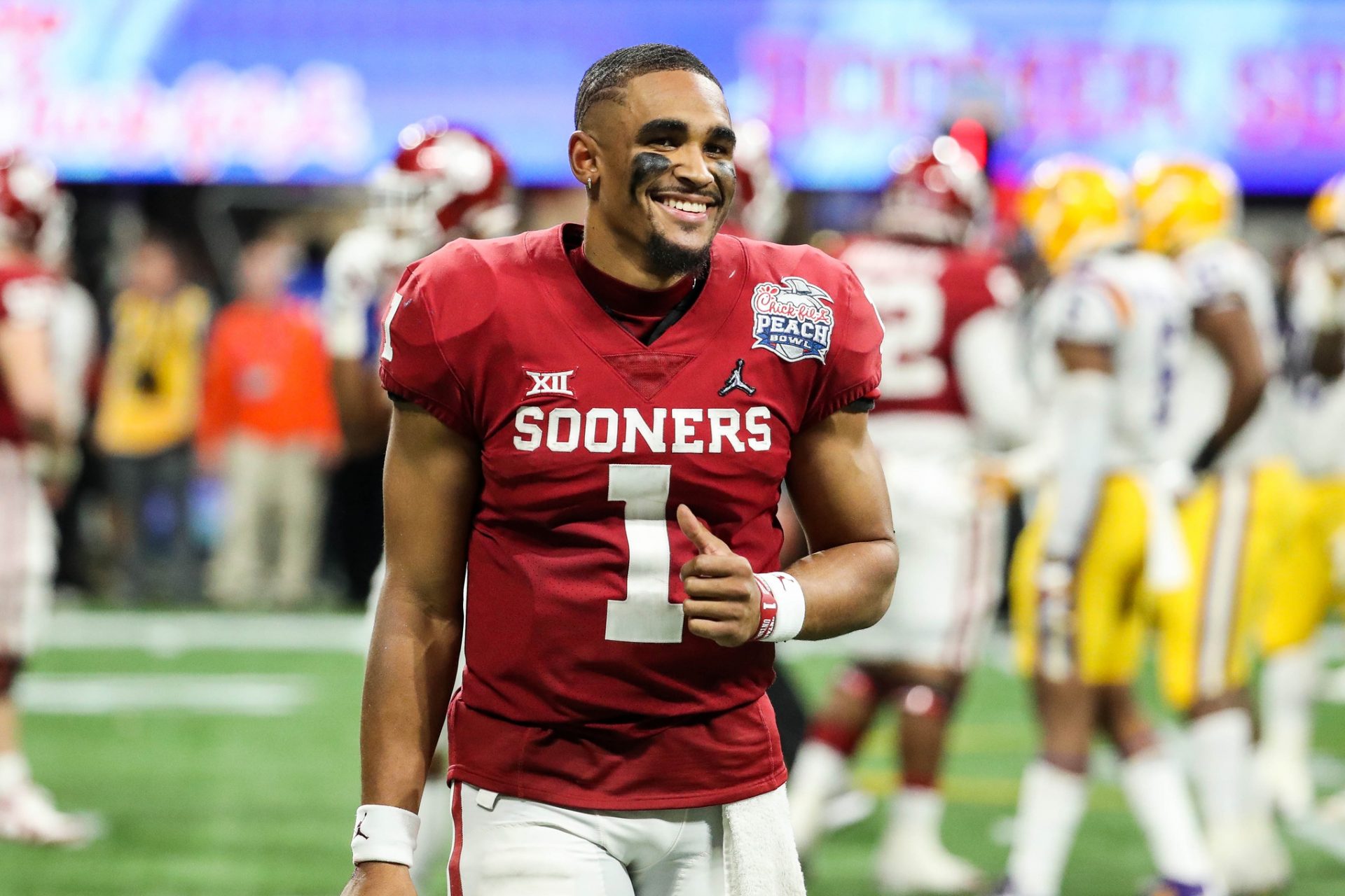 Oklahoma Sooners quarterback Jalen Hurts (1) reacts during the fourth quarter of the 2019 Peach Bowl college football playoff semifinal game between the LSU Tigers and the Oklahoma Sooners at Mercedes-Benz Stadium.