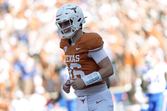 Texas Longhorns quarterback Arch Manning (16) reacts after a touchdown was scored during the second half against the Florida Gators at Darrell K Royal-Texas Memorial Stadium.