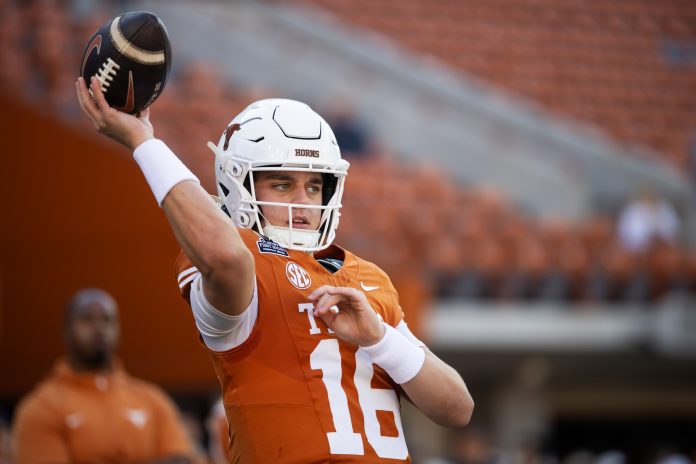 Texas Longhorns quarterback Arch Manning (16) against the Clemson Tigers during the CFP National playoff first round at Darrell K Royal-Texas Memorial Stadium.