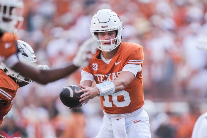 Texas Longhorns quarterback Arch Manning (16) passes off the ball as the Texas Longhorns take on Colorado State at Darrell K Royal-Texas Memorial Stadium in Austin Saturday, Aug. 31, 2024.