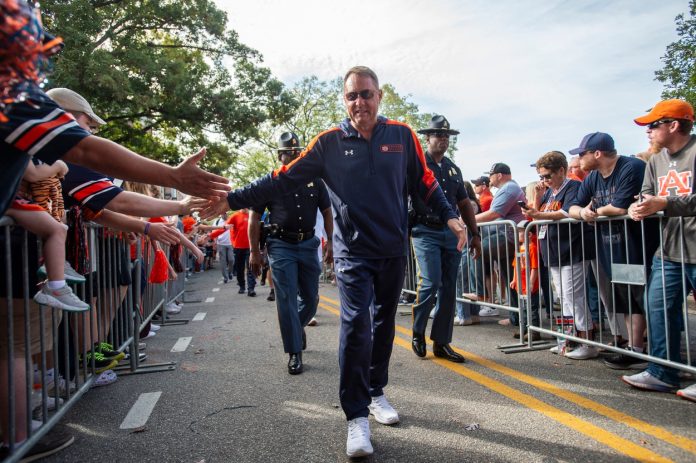 Auburn Tigers head coach Hugh Freeze greets fans during Tiger Walk before Auburn Tigers take on Vanderbilt Commodores at Jordan-Hare Stadium in Auburn, Ala., on Saturday, Nov. 2, 2024.