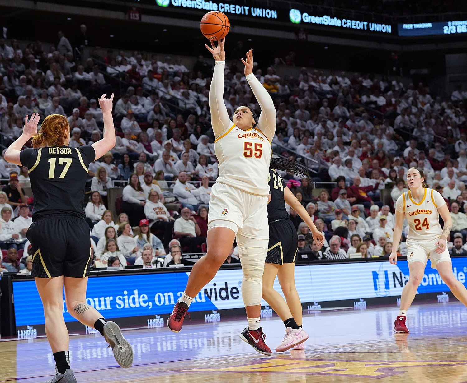 Iowa State Cyclones' center Audi Crooks (55) shoots the ball over Colorado Buffaloes's forward Tabitha Betson (17) during the second quarter in the Big-12 women’s basketball at Hilton Coliseum on Saturday, Feb. 8, 2025, in Ames, Iowa.