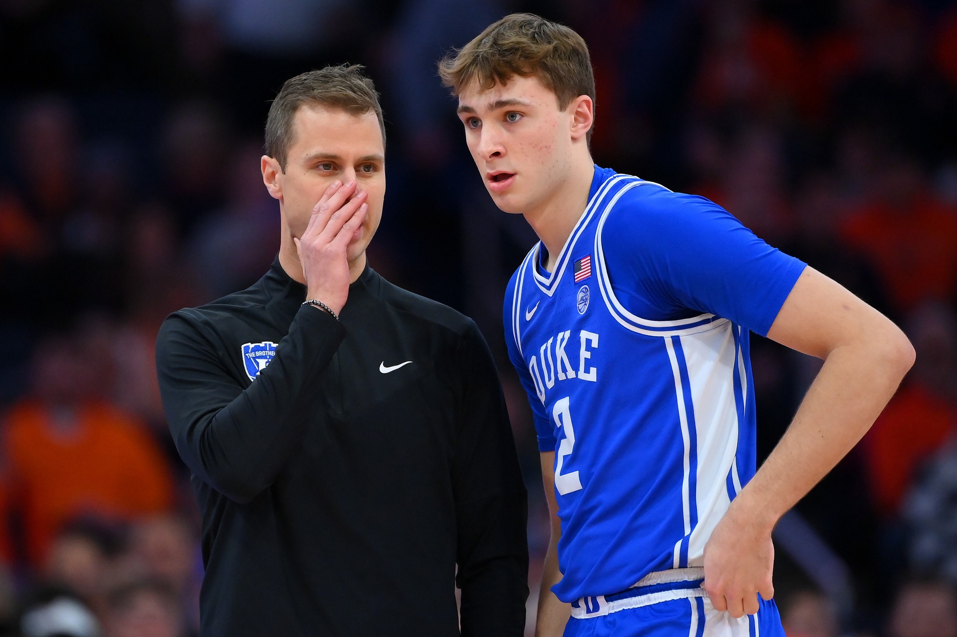 Duke Blue Devils head coach Jon Scheyer talks with guard Cooper Flagg (2) against the Syracuse Orange during the first half at the JMA Wireless Dome.