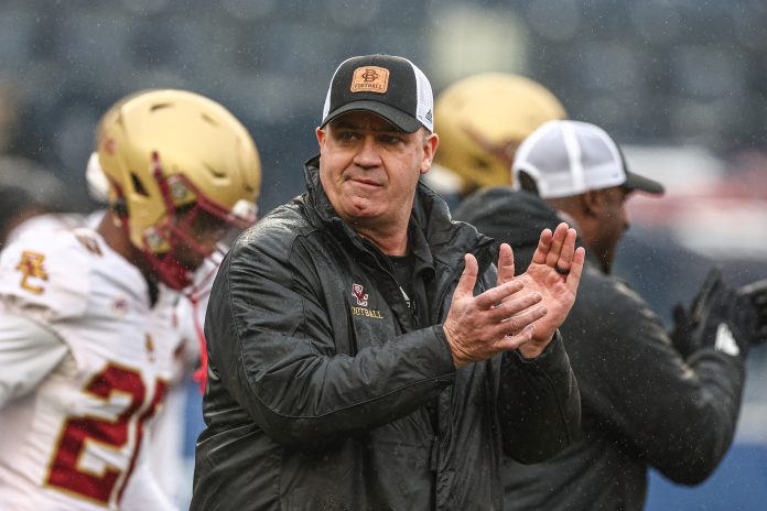 Boston College Eagles head coach Bill O'Brien on the field before the game against the Nebraska Cornhuskers at Yankee Stadium.