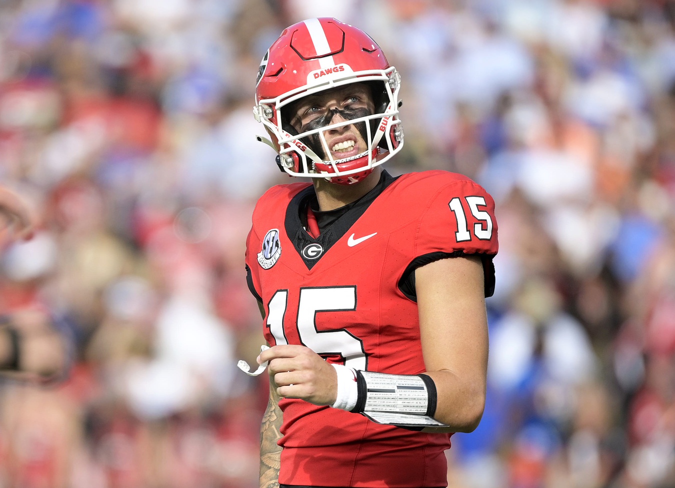 Georgia Bulldogs quarterback Carson Beck (15) reacts after throwing an interception against the Florida Gators during the first quarter at EverBank Stadium.