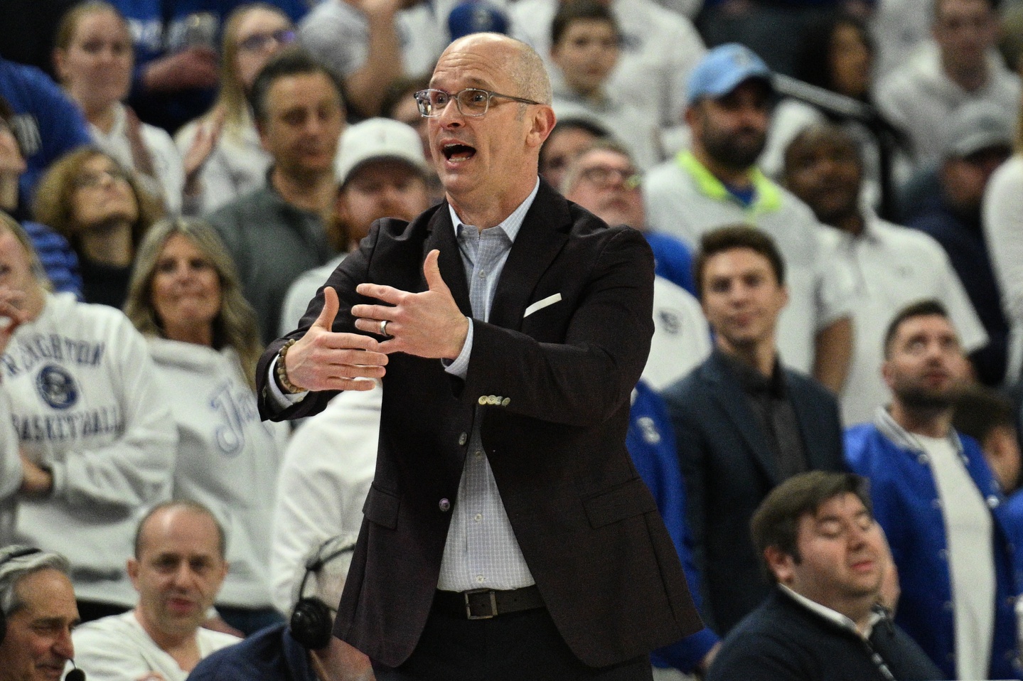 Connecticut Huskies head coach Dan Hurley signals to an official during the game against the Creighton Bluejays during the second half at CHI Health Center Omaha.