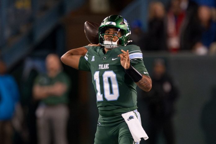 Tulane Green Wave quarterback Darian Mensah (10) throws against the Memphis Tigers during the first quarter at Yulman Stadium.