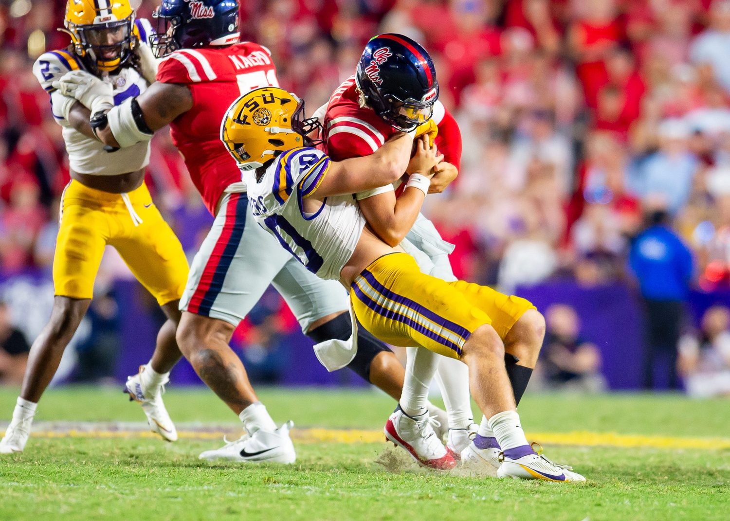 Linebacker Whit Weeks 40 sacks quarterback Jaxson Dart 2 as the LSU Tigers take on the Ole Miss Rebels at Tiger Stadium in Baton Rouge, LA. Saturday, Oct. 12, 2024.Saturday, Oct. 12, 2024.