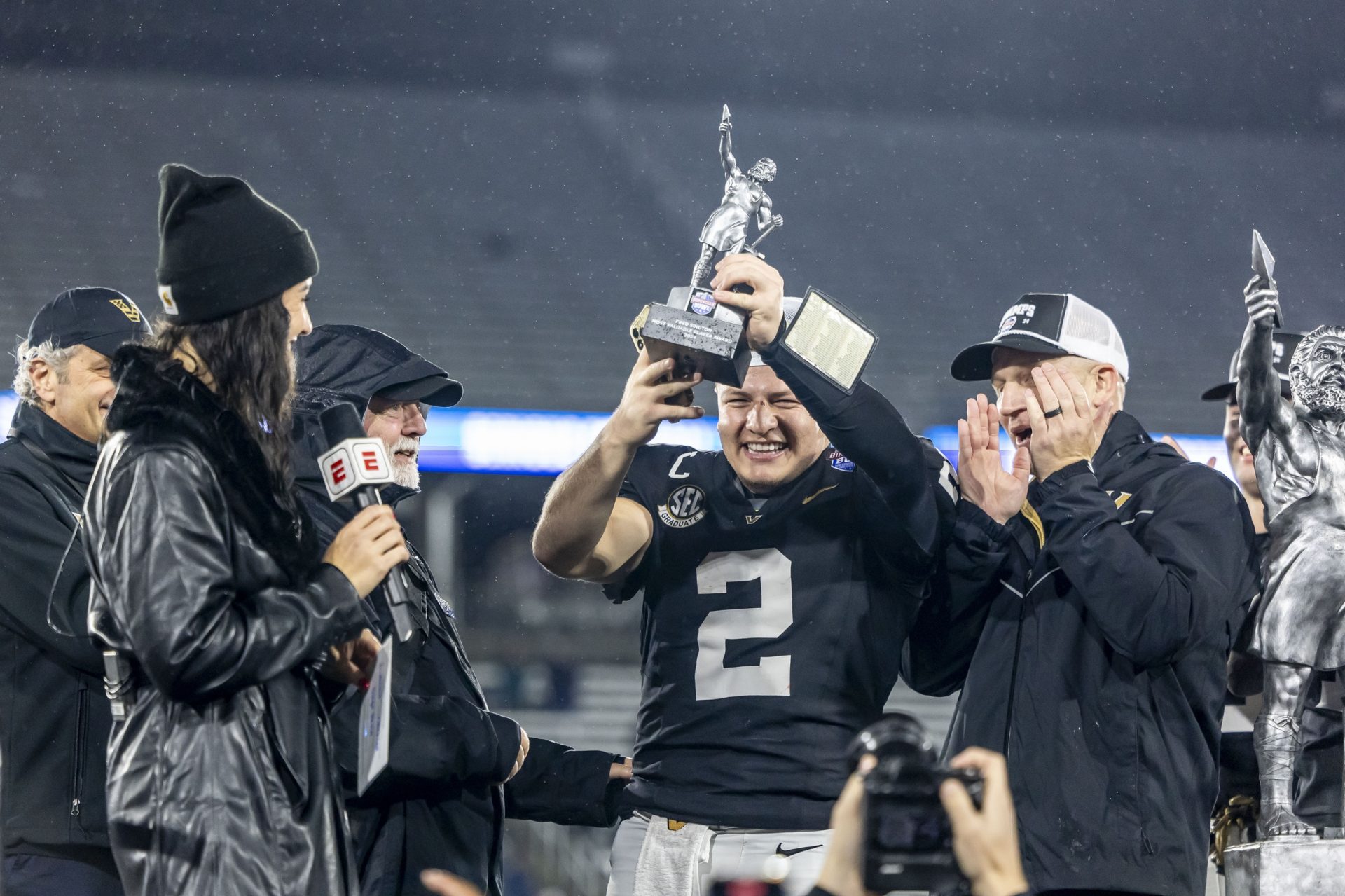 Vanderbilt Commodores quarterback Diego Pavia (2) hoists the MVP trophy after defeating the Georgia Tech Yellow Jackets in the 2024 Birmingham Bowl at Protective Stadium.
