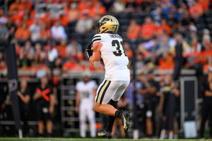 Purdue Boilermakers defensive back Dillon Thieneman (31) fields a punt during the first quarter against the Oregon State Beavers at Reser Stadium.