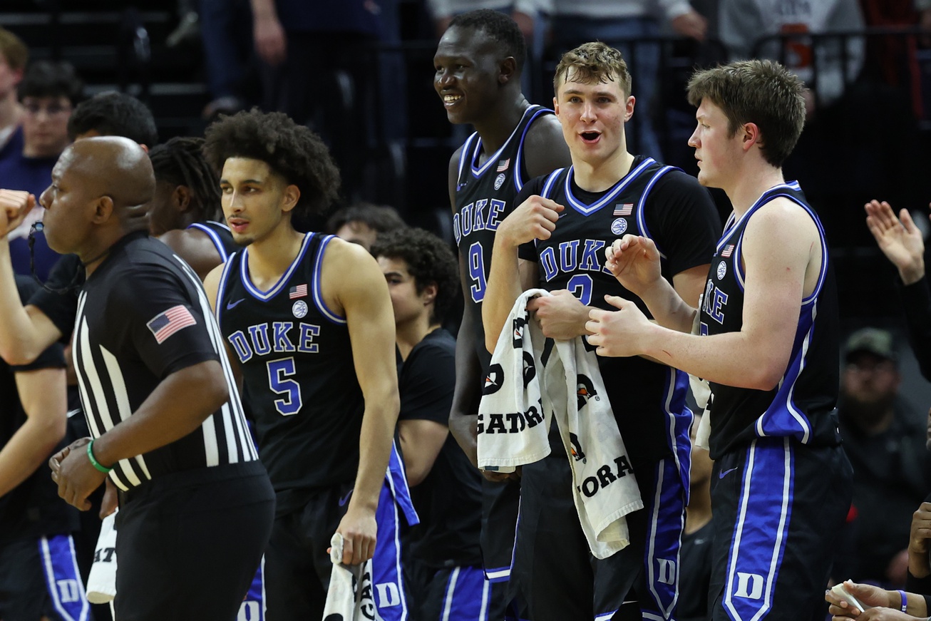 Duke Blue Devils guard Cooper Flagg (2) celebrates with teammates in the final seconds against the Virginia Cavaliers at John Paul Jones Arena.