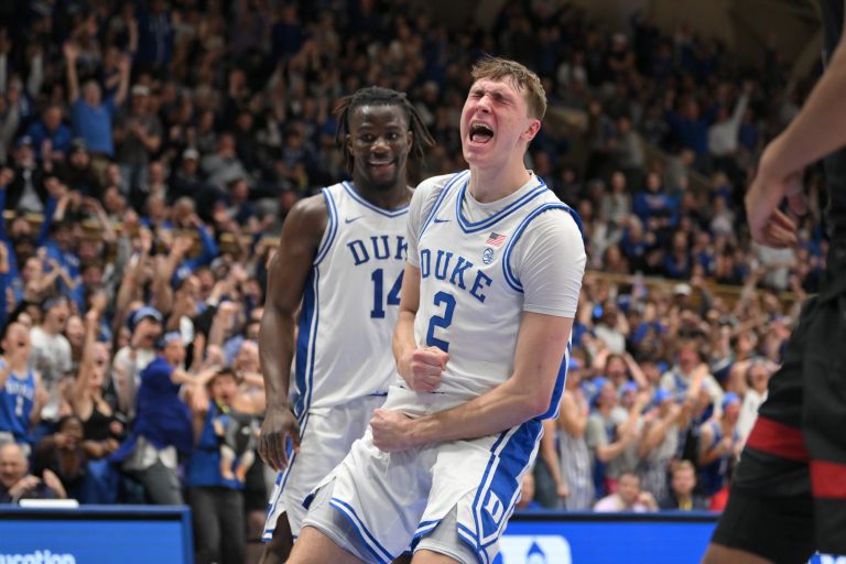 Duke Blue Devils forward Cooper Flagg (2) celebrating after dunking against the Stanford Cardinal during the second half at Cameron Indoor Stadium.