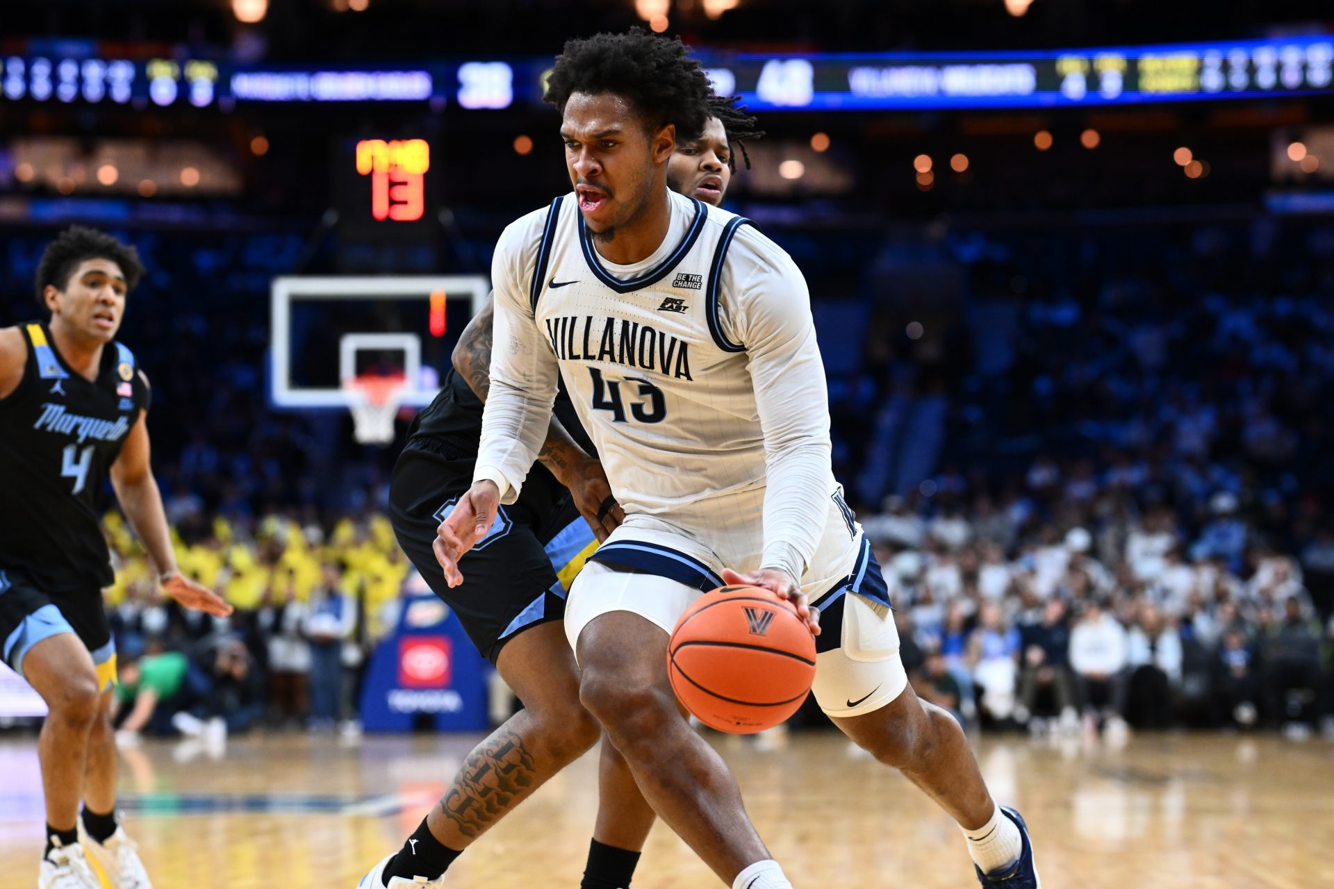 Villanova Wildcats forward Eric Dixon (43) drives against Marquette Golden Eagles forward David Joplin (23) in the second half at Wells Fargo Center.