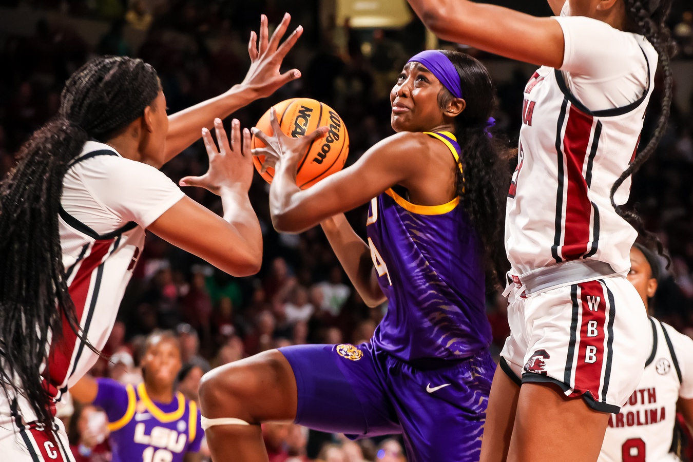 LSU Lady Tigers guard Flau'Jae Johnson (4) drives against the South Carolina Gamecocks in the second half at Colonial Life Arena.