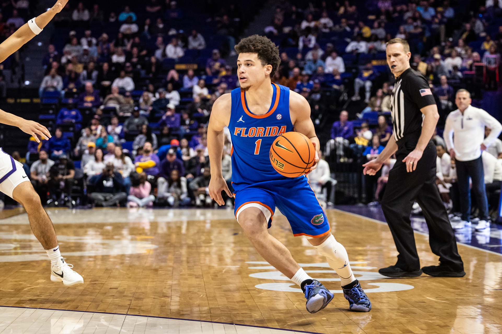 Florida Gators guard Walter Clayton Jr. (1) brings the ball up court against the LSU Tigers during the second half at Pete Maravich Assembly Center.