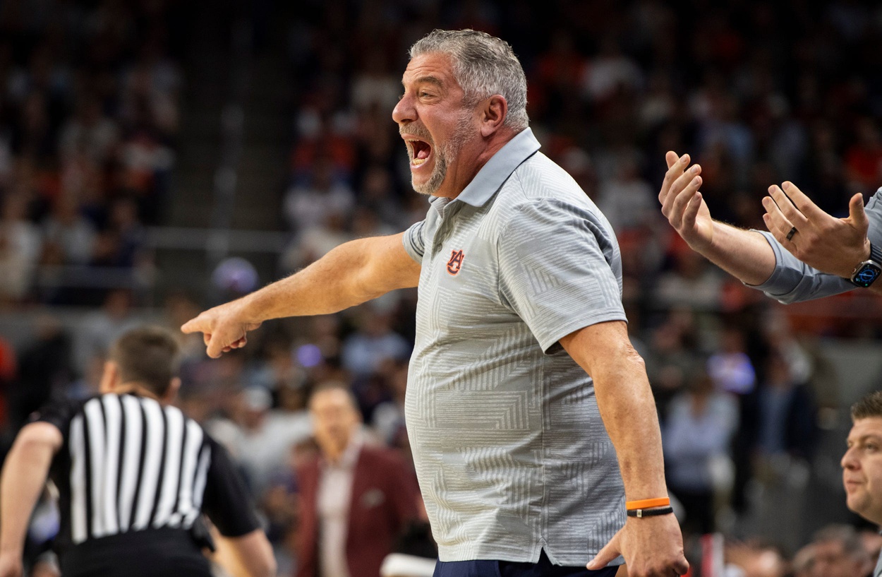 Auburn Tigers head coach Bruce Pearl talks with his team as Auburn Tigers take on Arkansas Razorbacks at Neville Arena in Auburn, Ala., on Wednesday, Feb. 19, 2025.