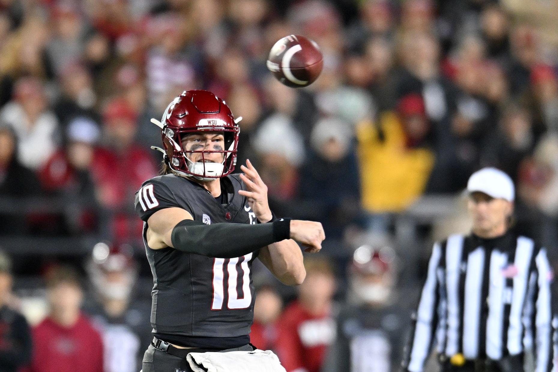 Washington State Cougars quarterback John Mateer (10) throws a pass against the Utah State Aggies in the first half at Gesa Field at Martin Stadium.