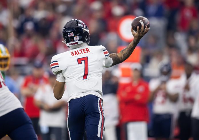 Liberty Flames quarterback Kaidon Salter (7) against the Oregon Ducks in the 2024 Fiesta Bowl at State Farm Stadium.