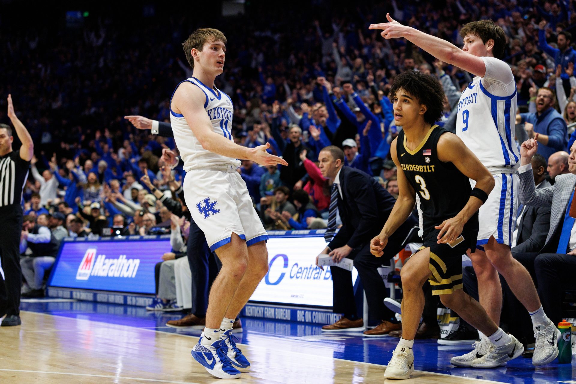 Kentucky Wildcats guard Travis Perry (11) celebrates after making a three point basket during the second half against the Vanderbilt Commodores at Rupp Arena at Central Bank Center.