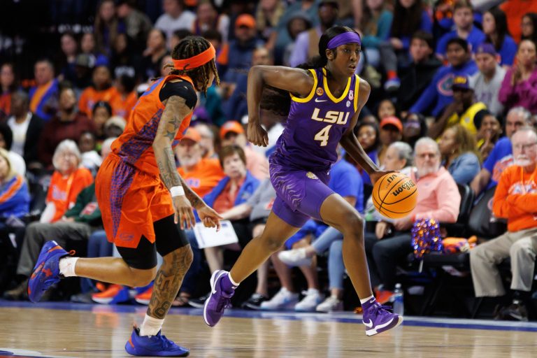 LSU star Flau'jae Johnson unveils her alter ego while teasing a big surprise for her Feb. 14 album release.