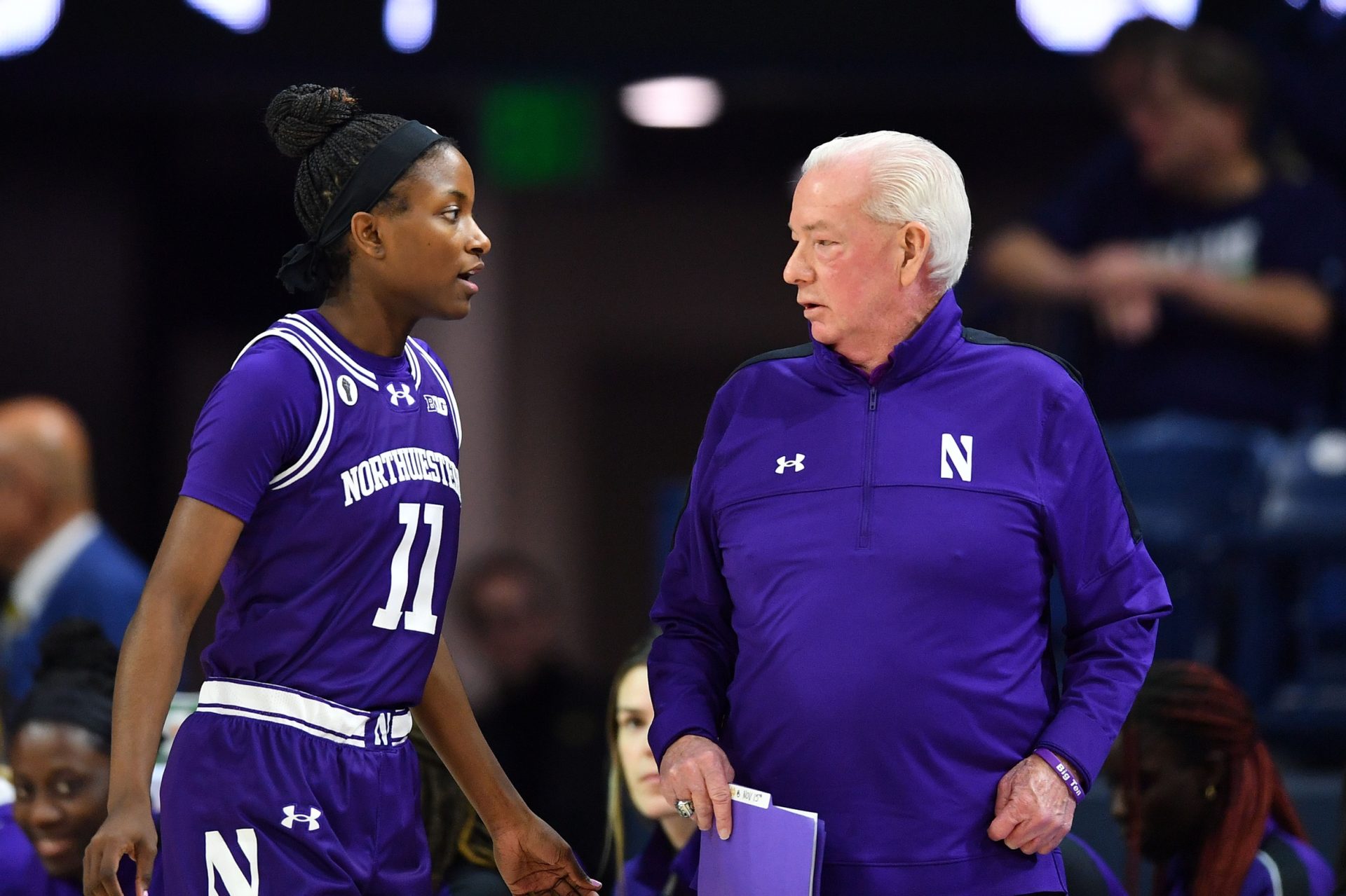 Northwestern Wildcats head coach Joe McKeown talks to guard Hailey Weaver (11) in the first half against the Notre Dame Fighting Irish at the Purcell Pavilion.